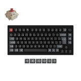 Black mechanical keyboard with keycaps on a white background